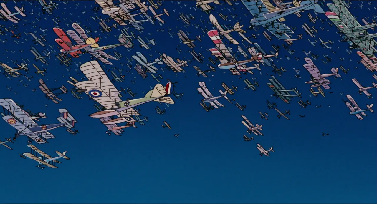 A group of airplanes in the sky