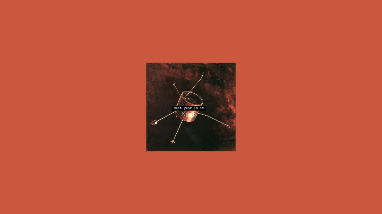 A satellite in space with a black text