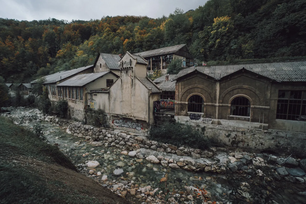 A building next to a river