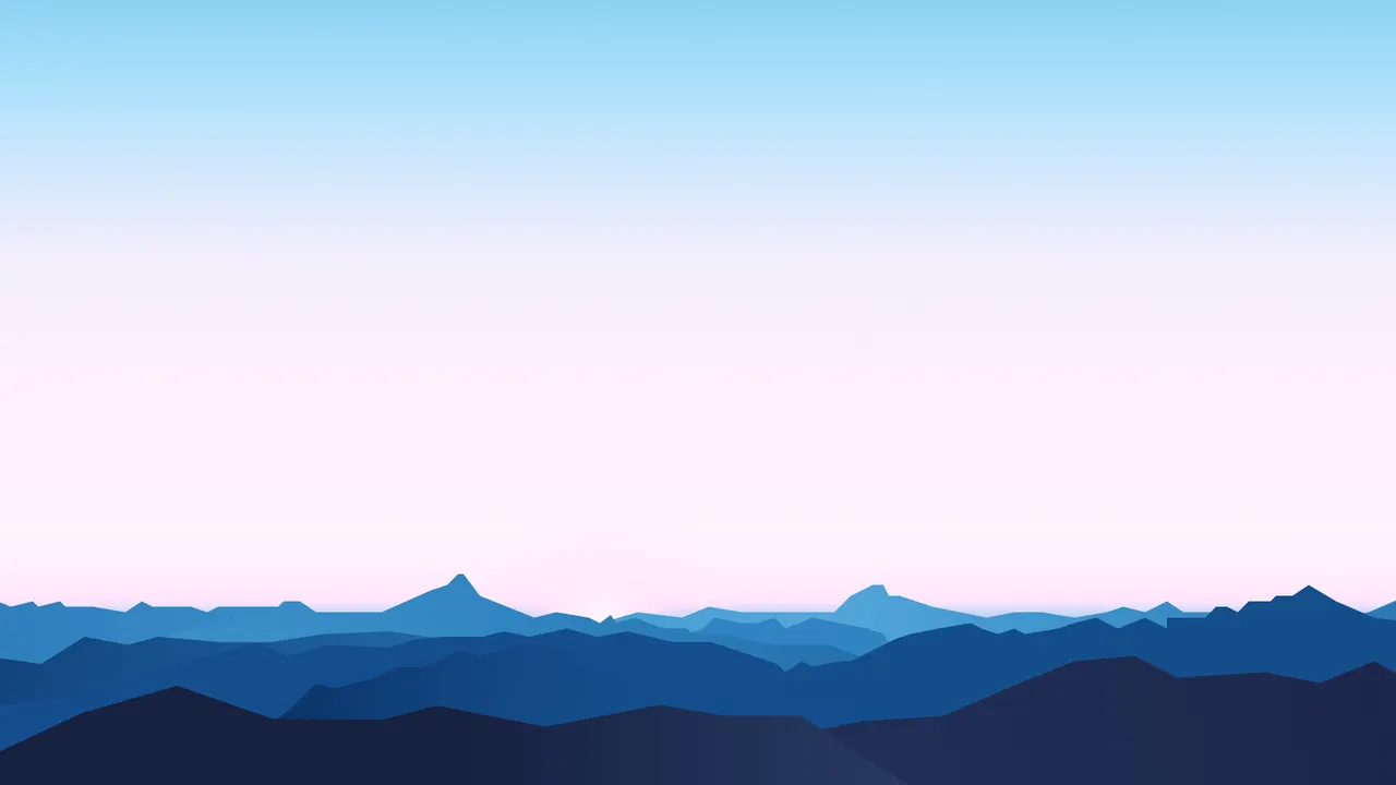 A blue and pink sky over a mountain range