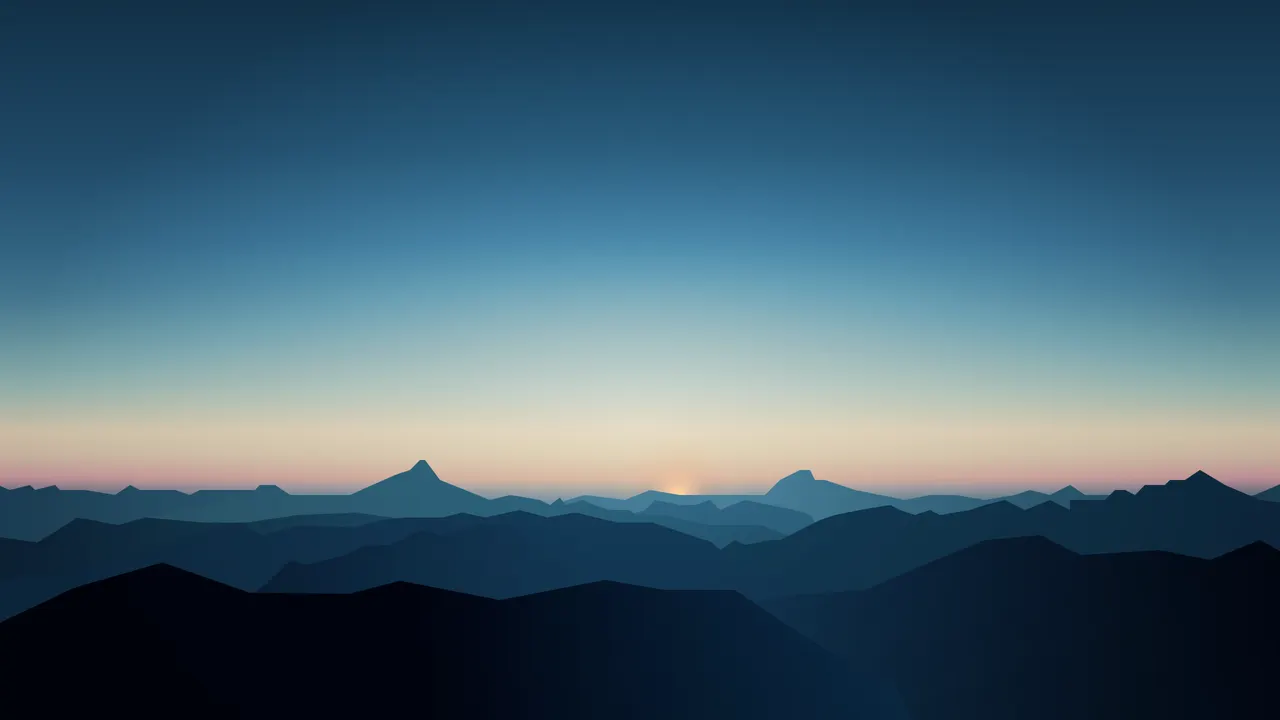 A landscape of mountains and a sunset