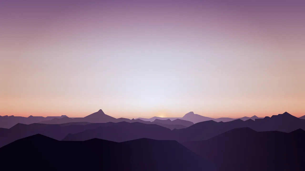 A landscape of mountains and a sunset