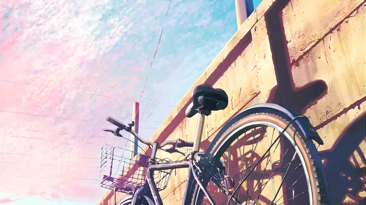 A bicycle leaning against a wall
