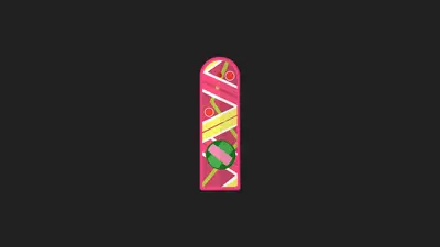 A pink and green object with circles and dots
