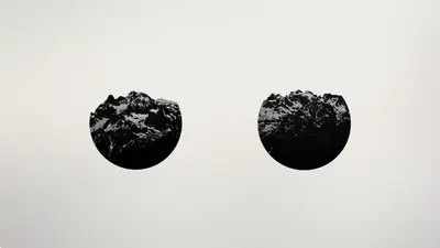 Two black and white images of mountains