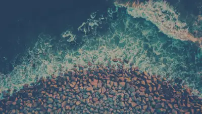 A rocky shore with waves crashing