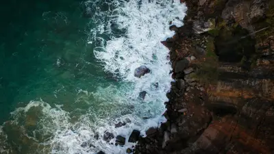 Waves crashing on rocks