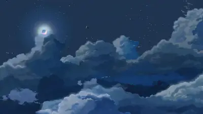 A moon and clouds at night