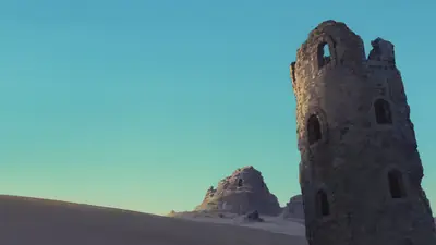 A stone tower with windows