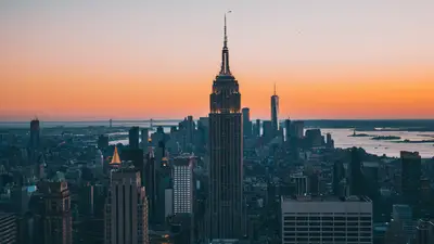 A city skyline with a tall building