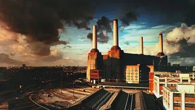 A factory with smoke coming out of the chimney