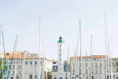 A lighthouse in front of a building