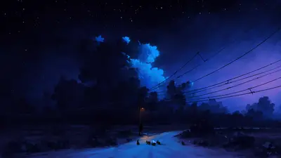 A night sky with clouds and a street light