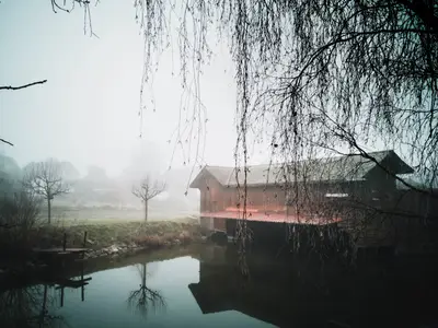 A building on a foggy day