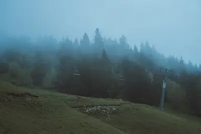 A chairlifts on a mountain