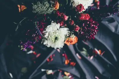 A bouquet of flowers on a cloth