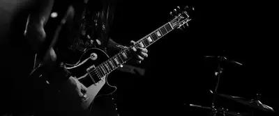 A person playing a guitar