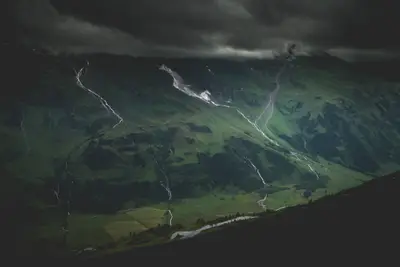 A mountain with a road going through it