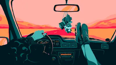 A person's feet in a car