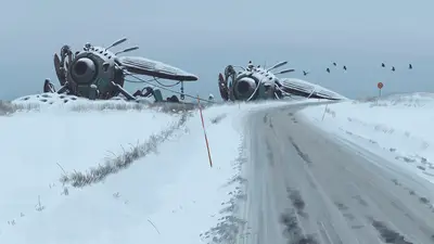A snow covered road with two large machines