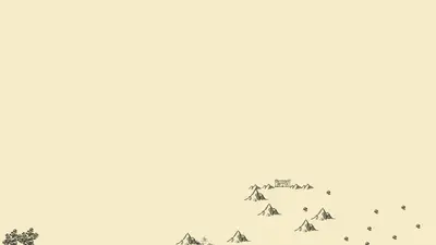A group of mountains with a building in the background